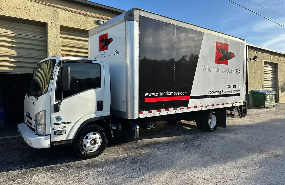 Atlantic Group USA branded moving truck parked at a storage facility